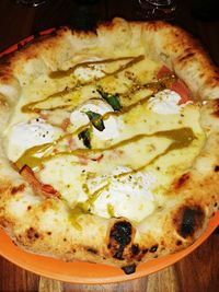 High angle view of pizza in plate on table