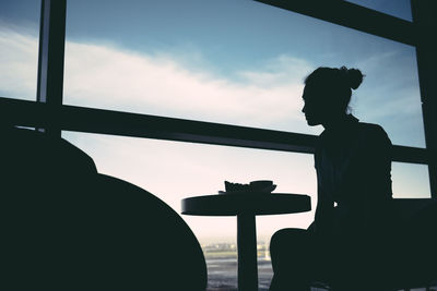 Woman waiting at airport lounge