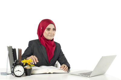 Portrait of woman using mobile phone