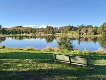 Scenic view of lake against blue sky