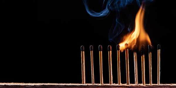 Close-up of fire against black background