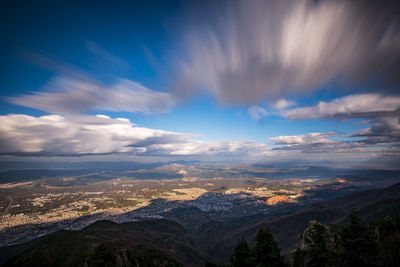 Aerial view of landscape against sky during sunset