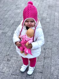 Portrait of cute girl in snow