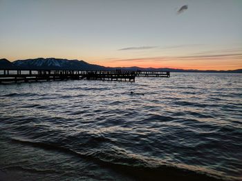 Scenic view of sea against sky during sunset