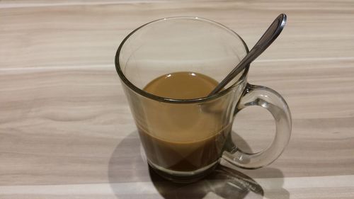 Close-up of coffee cup on table