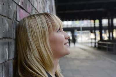 Close-up of beautiful woman standing outdoors