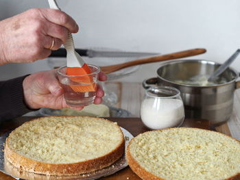 Close-up of man preparing food