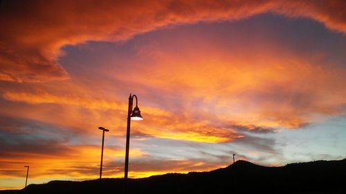 Low angle view of dramatic sky during sunset