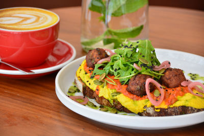 Close-up of food served on table