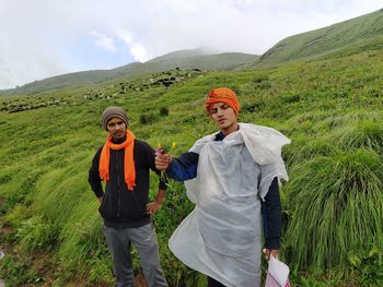 Full length of a man standing on mountain