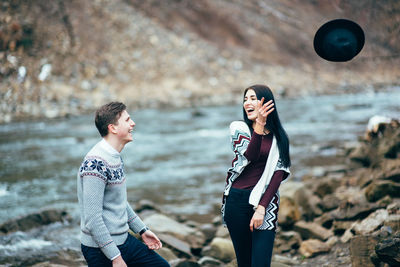 Young couple standing outdoors