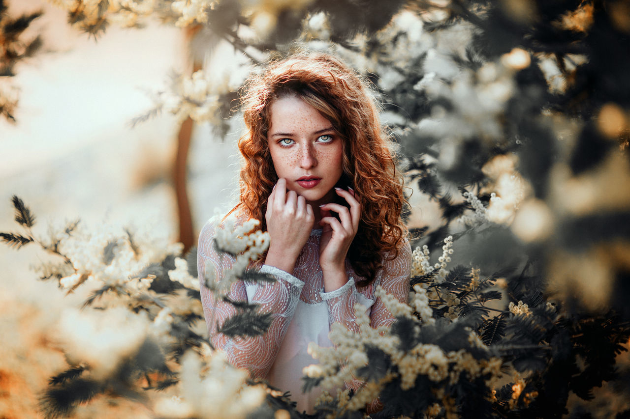 portrait, winter, beautiful people, beauty, looking at camera, women, fashion, young adult, human face, beautiful woman, human body part, young women, warm clothing, cold temperature, green color, adult, one person, nature, only women, people, silence, outdoors, adults only, one woman only, freckle, one young woman only, human hand, human lips, day