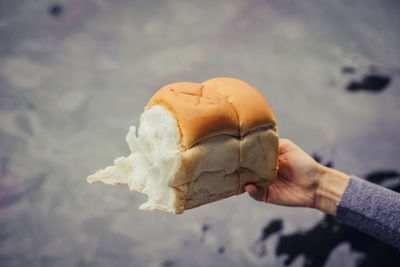 Person holding ice cream cone