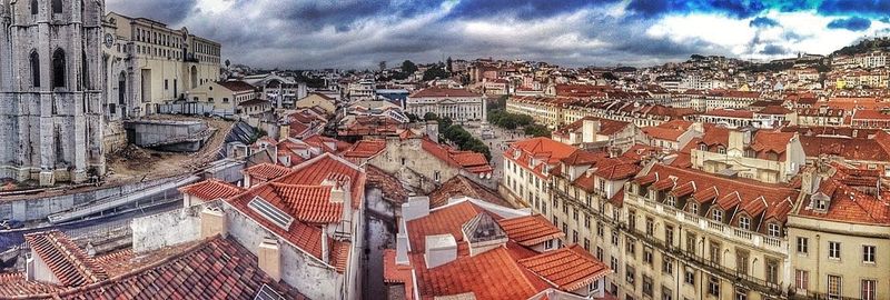 Town against cloudy sky