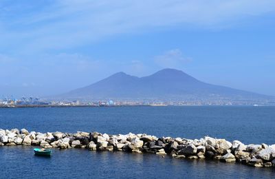 Scenic view of sea against blue sky