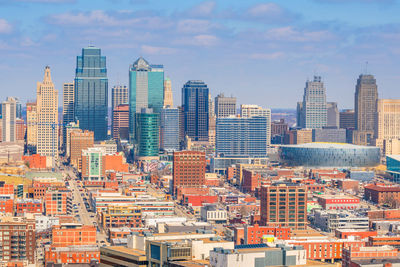 Modern buildings in city against sky