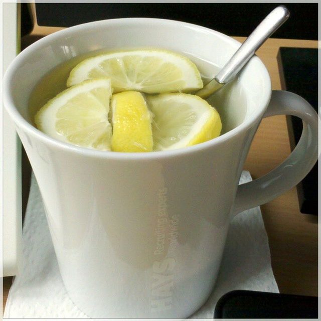 food and drink, indoors, freshness, food, healthy eating, still life, table, close-up, drink, bowl, spoon, high angle view, refreshment, plate, yellow, coffee cup, slice, no people, coffee - drink, fruit