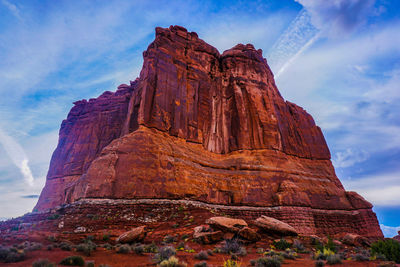 Low angle view of rock formation against sky