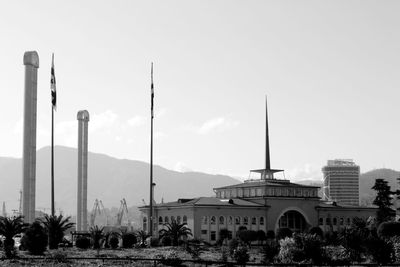 Panoramic view of buildings in city against clear sky