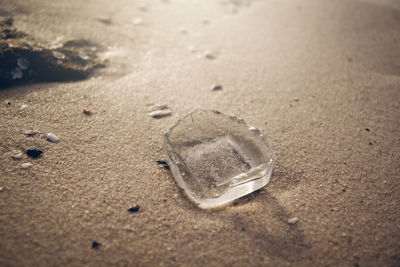 High angle view of wet sand on beach