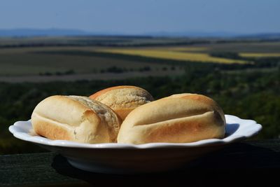 Close-up of bread in plate on table