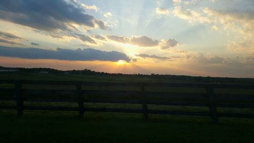 Scenic view of landscape at sunset