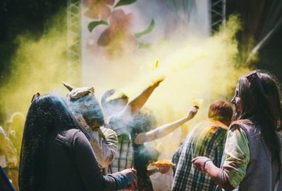 Rear view of people looking at music concert