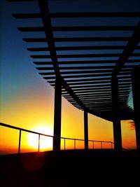 View of sunset seen through window