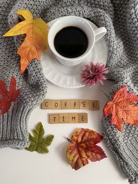 High angle view of coffee cup on table