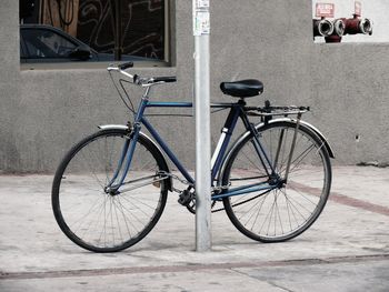 Bicycle parked on footpath