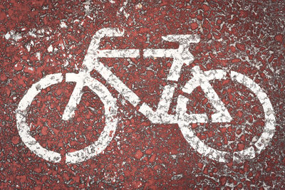 High angle view of bicycle sign on road