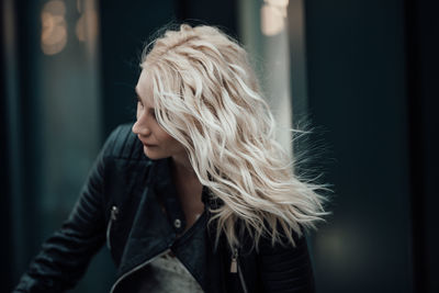 Portrait of young woman looking away