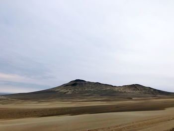 Scenic view of desert against sky