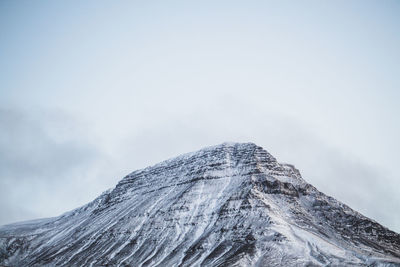 Scenic view of snowcapped mountain against sky