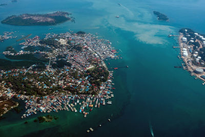 Aerial view of island by cityscape