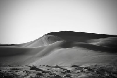 Scenic view of desert against clear sky