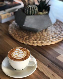 Coffee cup on table