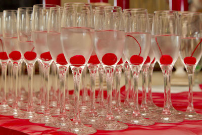 Close-up of wine glasses on table