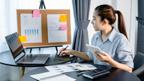 Businesswoman working at office