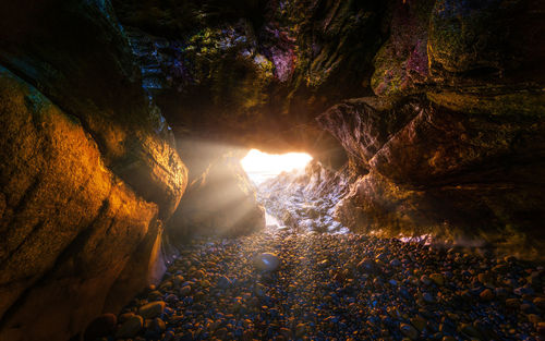 Sea cave at sunset