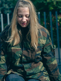 Portrait of young woman looking away