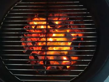 Close-up of fire on barbecue grill