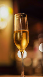 Close-up of wine glass on table