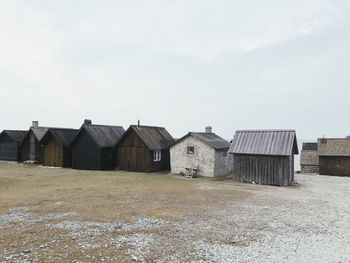 Houses against sea at beach