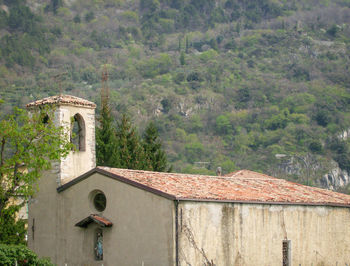 Low angle view of built structure on mountain