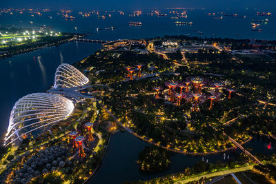 High angle view of illuminated cityscape at night