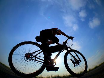 Low angle view of bicycle against sky