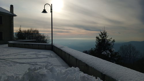 Street against sky during winter