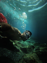 Man swimming in sea