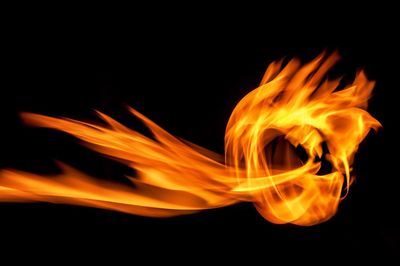 Close-up of fire against black background